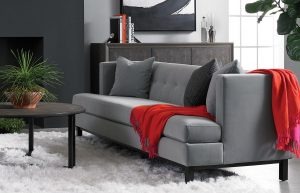 modern contemporary room loft precedent gray sofa with red drape