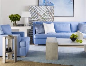 living room chaddock coastal furniture blue sofas with abstract art and white lamp and table