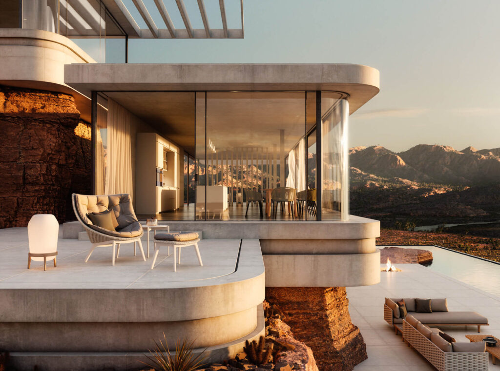 Chairs from DEDON's MBRACE collection on a patio in a desert home