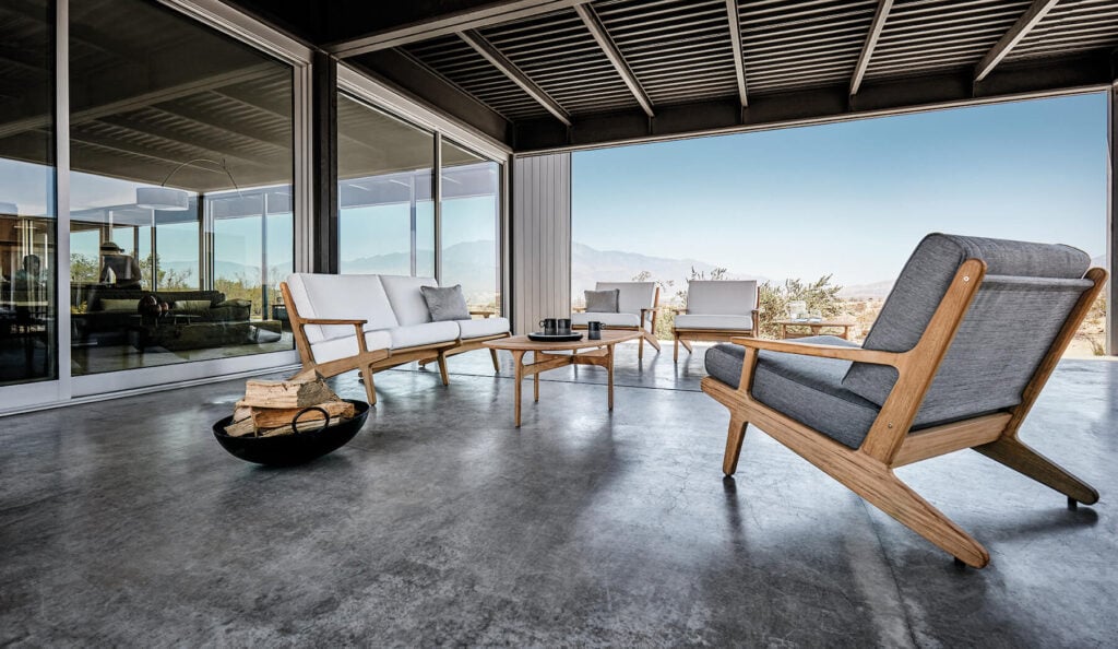 Reclined lounge chairs on industrial concrete patio