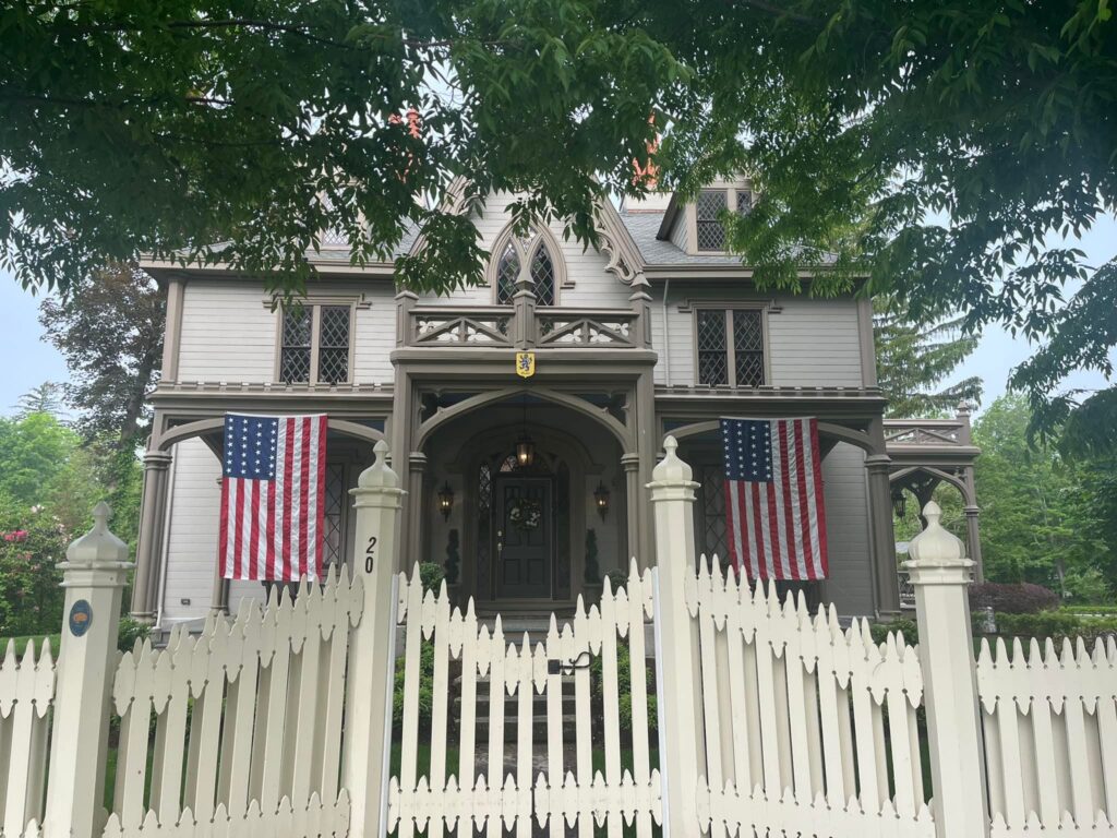 Fully restored William Mason House with green exterior and darker trim